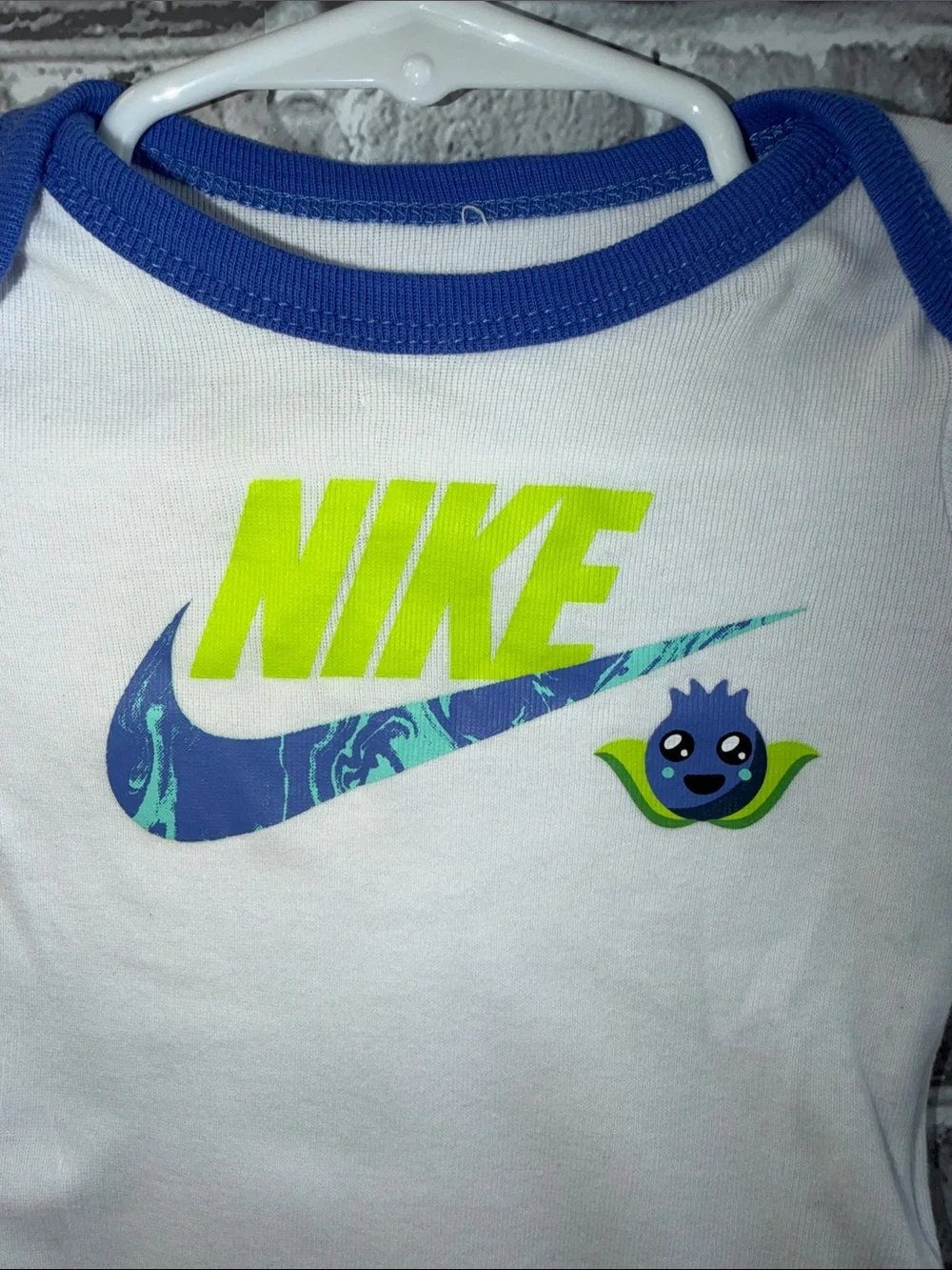 Baby Nike White One-Piece Bodysuit with Blue Trim & Neon Green Logo‎